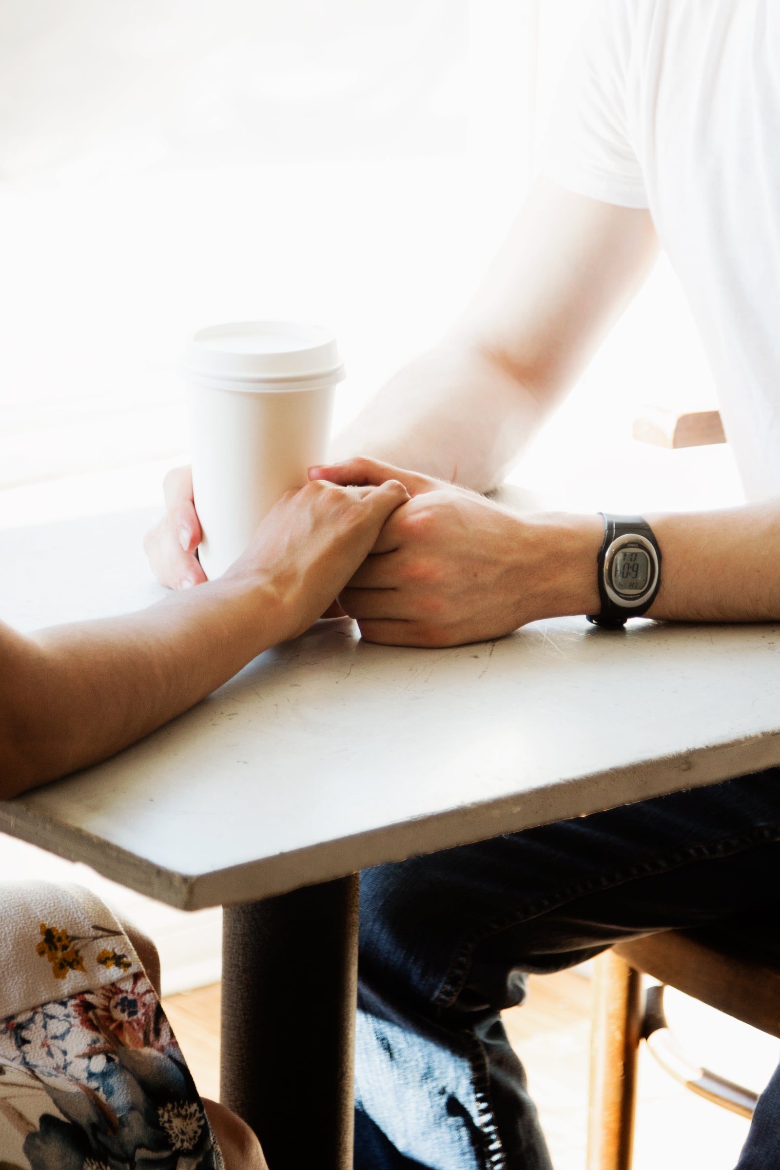 Two people sharing a warm look at home